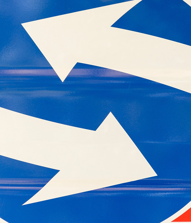 Woman in yellow sweater using phone